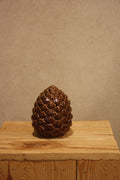Dennenappel met led licht.